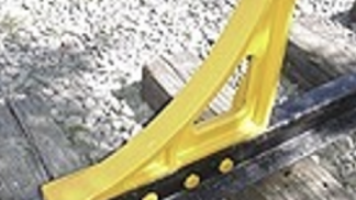 Tope de rueda tipo bisagra