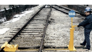 Descarrilador retráctil unidireccional